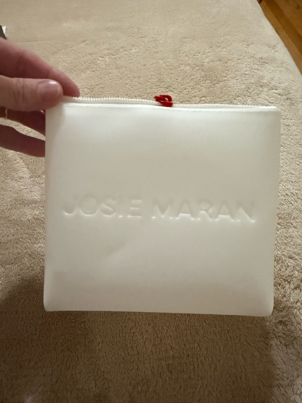 JOSIE MARAN White Cosmetic Zip Pouch with Red Pull